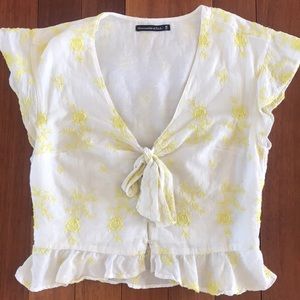 White and yellow blouse